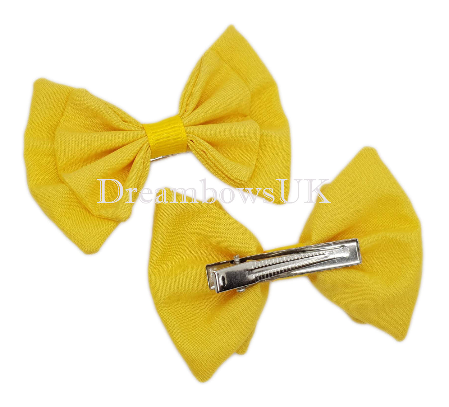 Golden yellow school bows on crocodile clips