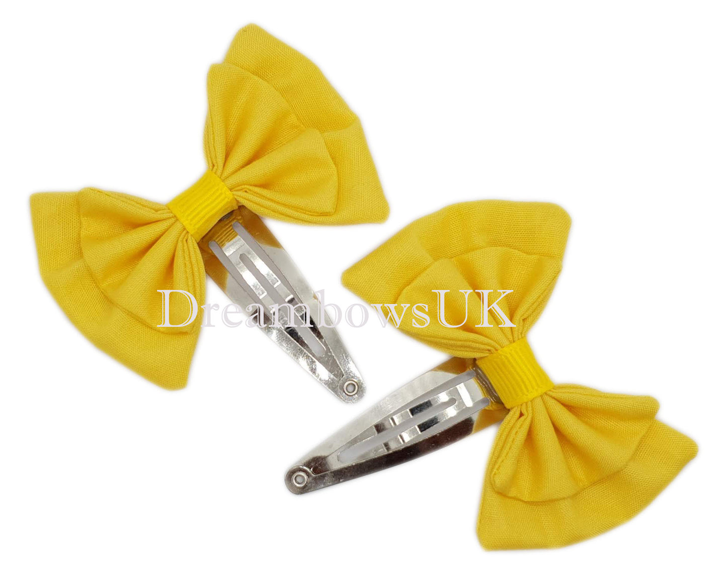 Golden yellow school bows on snap clips