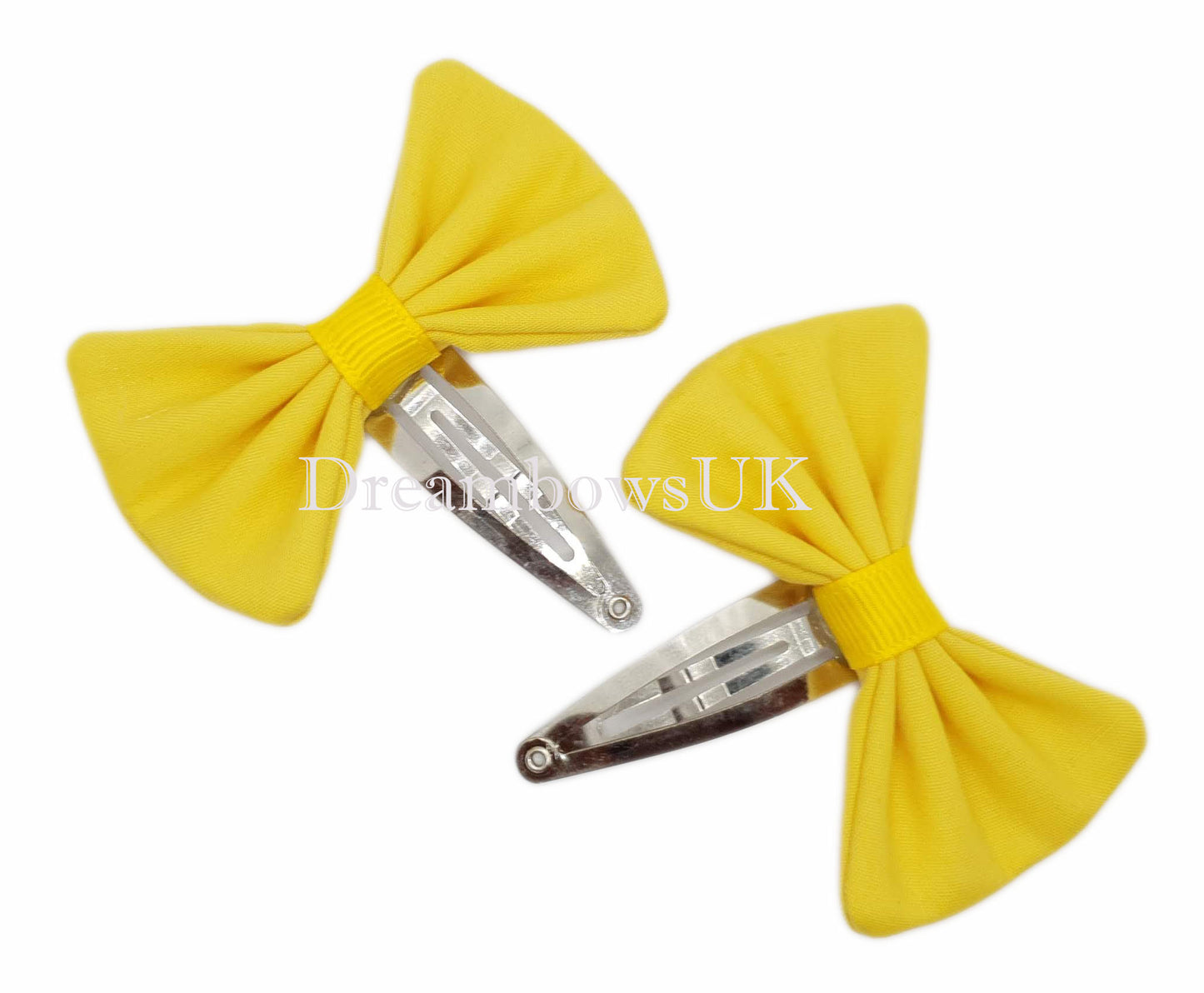 Golden yellow girls school bows on snap clips